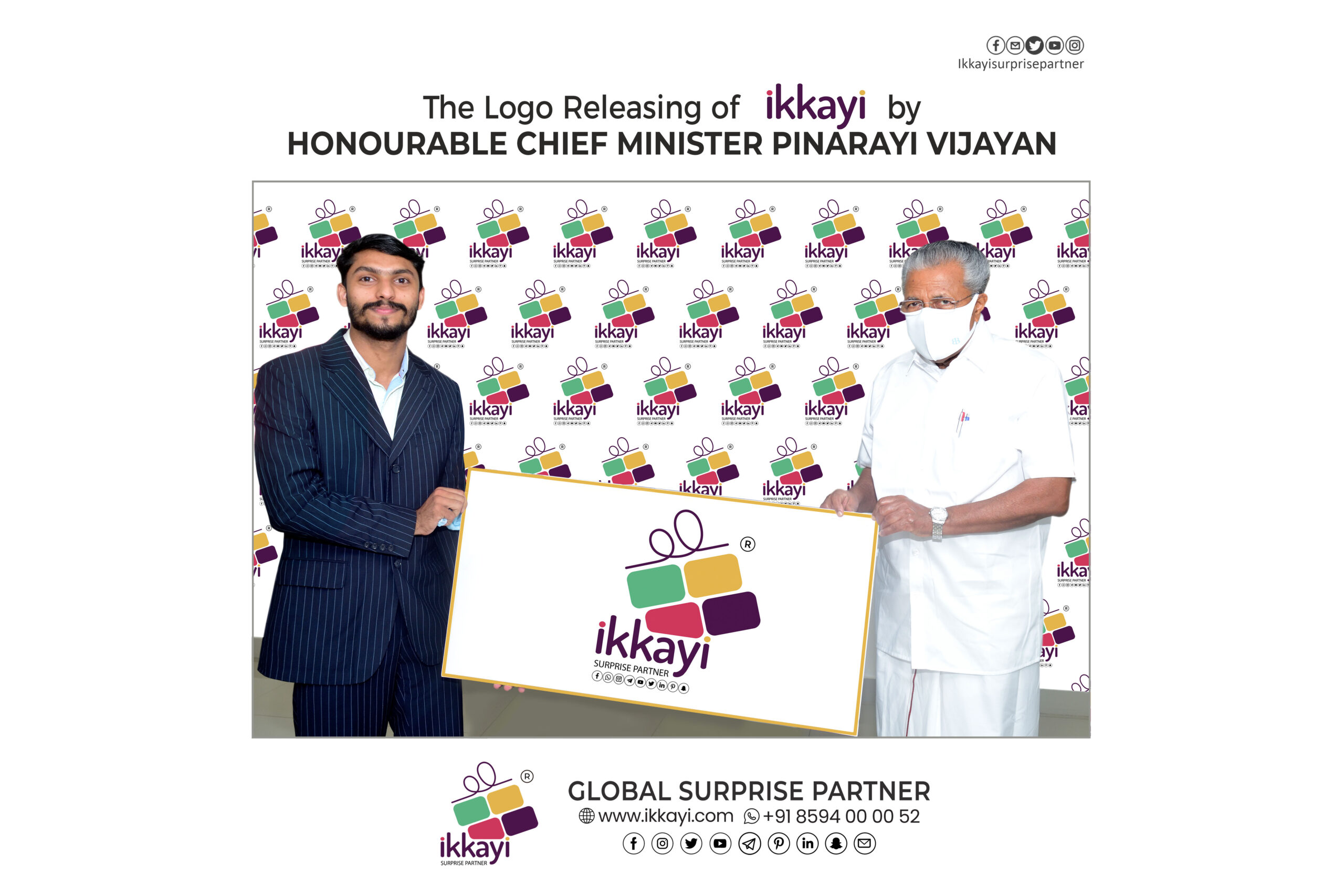 The image captures the official logo releasing event for Ikkai, which bills itself as a "GLOBAL SURPRISE PARTNER," by the Honourable Chief Minister of Kerala, Pinarayi Vijayan. Chief Minister Vijayan, dressed in traditional white attire, is seen on the right, alongside a representative of Ikkai (in a suit), as they unveil a large display board featuring the brand's logo—a stylized gift box—and name. The background is covered with the repeating Ikkai logo, reinforcing the branding for the launch. Further details at the bottom provide the company's website, www.ikkayi.com, and contact number, +91 8594 00 00 52
